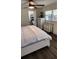 Main bedroom with king-size bed, dresser, and ensuite access at 7 Cocos Plumosa Dr # A, Eustis, FL 32726