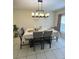 Spacious dining area with large table and chairs at 762 Squirrel Ct, Kissimmee, FL 34759