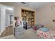 bedroom with twin bed and built-in closet at 7798 Snowberry Cir, Orlando, FL 32819