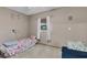 Small bedroom with two twin beds at 7798 Snowberry Cir, Orlando, FL 32819