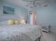 Guest bedroom with a queen-size bed and access to a hallway at 8480 Se 167Th Forsyth St, The Villages, FL 32162