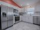 Modern kitchen with stainless steel appliances at 8480 Se 167Th Forsyth St, The Villages, FL 32162