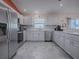 Modern kitchen with stainless steel appliances at 8480 Se 167Th Forsyth St, The Villages, FL 32162