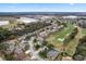 Aerial view of a residential community near a golf course at 9033 Laurel Ridge Dr, Mount Dora, FL 32757