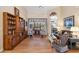 Living room with hardwood floors, fireplace and access to the backyard at 9033 Laurel Ridge Dr, Mount Dora, FL 32757