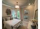 Charming bedroom with metal bed frame and neutral decor at 9918 Fiddley Aly, Orlando, FL 32827