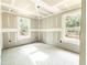 Unfinished bedroom featuring fresh drywall and two windows, offering a bright, customizable space at Lot 42 Indian Estates Cr 423, Lake Panasoffkee, FL 33538
