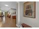 Living room with hardwood floors, showing a view to the dining room at 16967 Se 93Rd Cuthbert Cir, The Villages, FL 32162