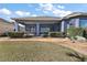 Screened porch with paver walkway at 10173 Lake Miona Way, Oxford, FL 34484