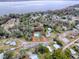 Aerial view of a single story home with a pool, located near a river at 1029 Cr 452A, Lake Panasoffkee, FL 33538