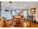 Charming dining room with wooden table and chairs, hardwood floors at 1101 Lantana Dr, Eustis, FL 32726