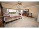 Bright bedroom with a comfortable bed and plenty of space at 11189 Roz Way, Oxford, FL 34484