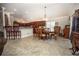 Bright dining area with hardwood floors and large windows at 11189 Roz Way, Oxford, FL 34484