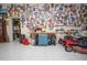 Well-equipped garage workshop featuring ample storage and workbenches at 11189 Roz Way, Oxford, FL 34484