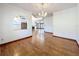 Bright dining room with hardwood floors and a chandelier at 1130 Elysium Blvd, Mount Dora, FL 32757