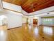 Bright and airy living room with hardwood floors and high ceilings at 1130 Elysium Blvd, Mount Dora, FL 32757