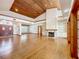 Living room with hardwood floors, fireplace and high ceilings at 1130 Elysium Blvd, Mount Dora, FL 32757