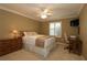 Guest bedroom with a workspace and built-in closet at 1189 Homeland Park St, The Villages, FL 32162