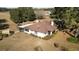 Aerial view of a ranch-style home on a large lot at 1199 Cr 542G, Bushnell, FL 33513