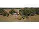 Aerial view of a home and surrounding property at 1199 Cr 542G, Bushnell, FL 33513