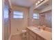 Bathroom with shower/tub combo and updated vanity at 1199 Cr 542G, Bushnell, FL 33513