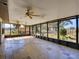 Large screened porch overlooking the rural landscape at 1199 Cr 542G, Bushnell, FL 33513