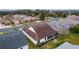 Aerial view showcasing the home's backyard and neighborhood at 1216 Addison Ave, The Villages, FL 32162