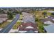 An aerial view of the house, highlighting its location within a community at 1216 Addison Ave, The Villages, FL 32162