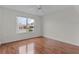 Well-lit bedroom with wood floors and a view at 1216 Addison Ave, The Villages, FL 32162