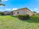 Well-maintained house exterior with manicured lawn and landscaping at 12213 Se 176Th Loop, Summerfield, FL 34491