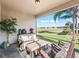 Relaxing screened porch overlooking a golf course at 12213 Se 176Th Loop, Summerfield, FL 34491