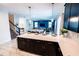 View of the kitchen island showcasing pendant lighting and an open concept design at 1257 Challenge Dr, Davenport, FL 33896