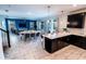 Open floorplan with tiled floors, a dining table, and a living area perfect for entertaining at 1257 Challenge Dr, Davenport, FL 33896