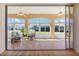 Bright sunroom with tiled floors and plenty of windows at 1276 Bennett Pl, The Villages, FL 32162