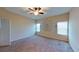 Spacious bedroom with ceiling fan and neutral decor at 1350 Cavender Creek Rd, Minneola, FL 34715