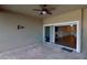 Covered patio with sliding glass doors leading inside at 1350 Cavender Creek Rd, Minneola, FL 34715