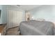 Spacious bedroom with a large closet and plenty of natural light at 1410 Conchas Dr, The Villages, FL 32162