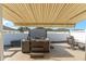 Relax under the covered patio in your private hot tub at 1410 Conchas Dr, The Villages, FL 32162