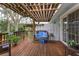 Relaxing deck with seating area, perfect for outdoor enjoyment at 1420 Anderson St, Clermont, FL 34711