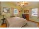 Charming bedroom with ceiling fan and built-in desk at 1420 Anderson St, Clermont, FL 34711