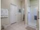 Guest bathroom with shower and tile floor at 16841 Se 84Th Colerain Cir, The Villages, FL 32162