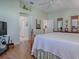 Spacious bedroom with wood floors and ceiling fan at 16841 Se 84Th Colerain Cir, The Villages, FL 32162