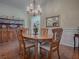 Formal dining room featuring a wood table and hutch at 16841 Se 84Th Colerain Cir, The Villages, FL 32162