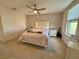 Bright bedroom with ceiling fan and neutral decor at 16929 Tesla Aly, Winter Garden, FL 34787