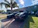 Home exterior with two-car driveway at 16929 Tesla Aly, Winter Garden, FL 34787