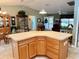 Large kitchen island with substantial storage and counter space at 17483 Se 74Th Netherclift Ter, The Villages, FL 32162