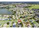Wide aerial view of the house and neighborhood at 2001 Cordero Ct, The Villages, FL 32159