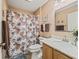 Clean bathroom with shower/tub combo, vanity, and updated countertop at 2001 Cordero Ct, The Villages, FL 32159
