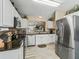 Modern kitchen with stainless steel appliances and granite countertops at 2001 Cordero Ct, The Villages, FL 32159