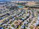 An aerial view of a single-Gathering home in a residential community at 2009 Claudio Ln, The Villages, FL 32159